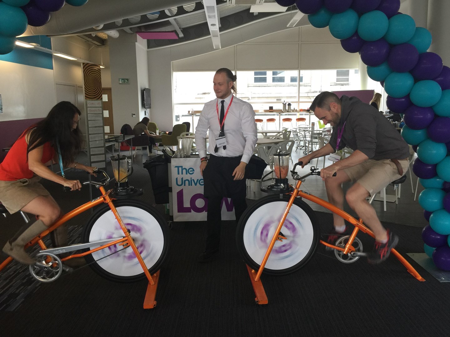 University of Law Leeds students compete on a smoothie bike challenge during Wellbeing Week