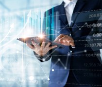 Business man using tablet device
