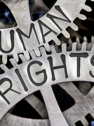 Cogs with 'Human rights' written on it