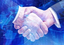 Digital map superimposed with two men shaking hands