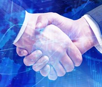 Digital map superimposed with two men shaking hands