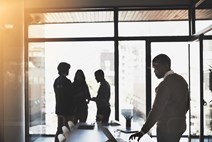 Professionals in office space