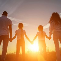 Family holding hands 