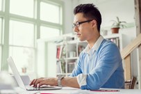 male working on a laptop