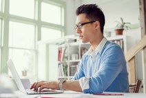 male working on a laptop