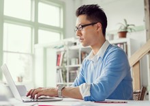 male working on a laptop