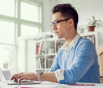 male working on a laptop