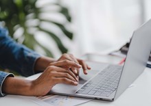 Person working on a laptop