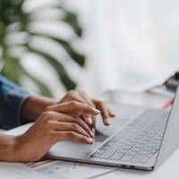 Person working on a laptop
