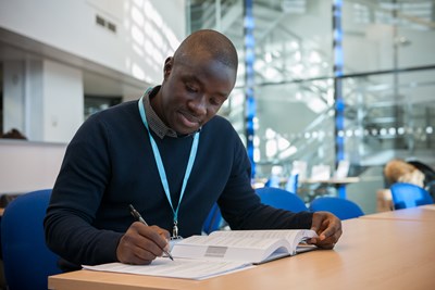 Student working from a text book