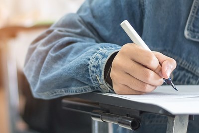 Student taking a written exam