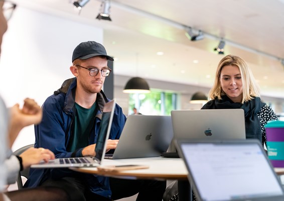 Students working on laptops