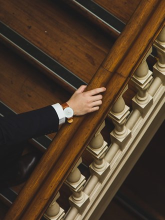 Hand on banister Hand on banister