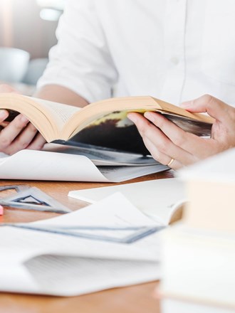 Student reading a book