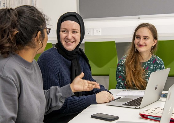 Students working together in class