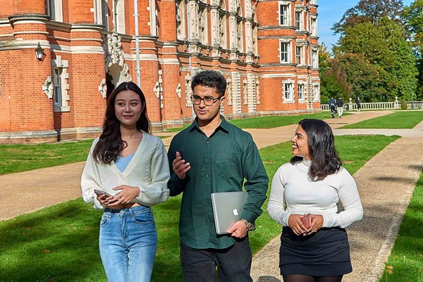 Students walking outside Royal Holloway Law School