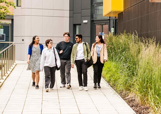 Group of students walking on campus