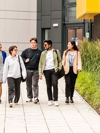 Group of students walking on campus