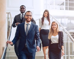 Coworkerrs walking down stairs