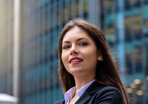 Woman cross armed in a suit