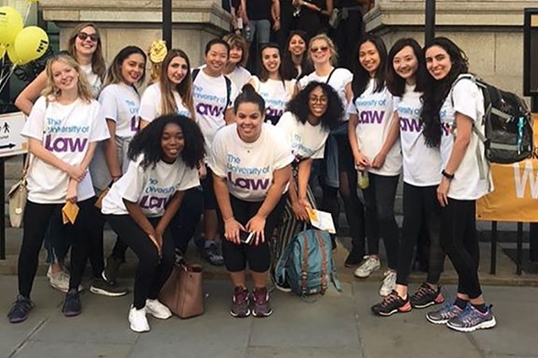 A group of ULaw students in branded tshirts