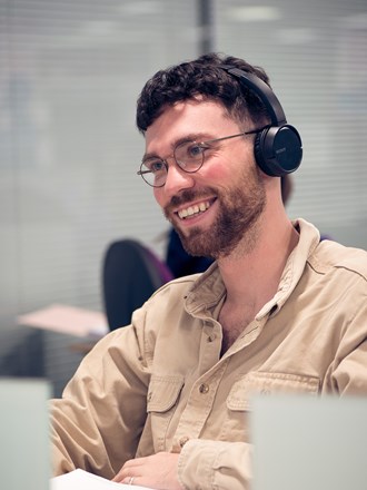 Student wearing headphones Student wearing headphones