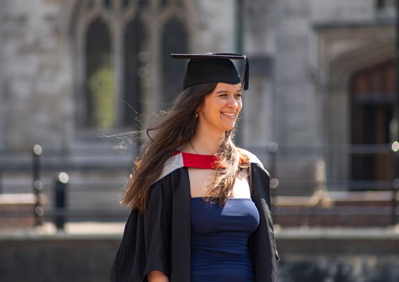 Student wearing academic dress outside