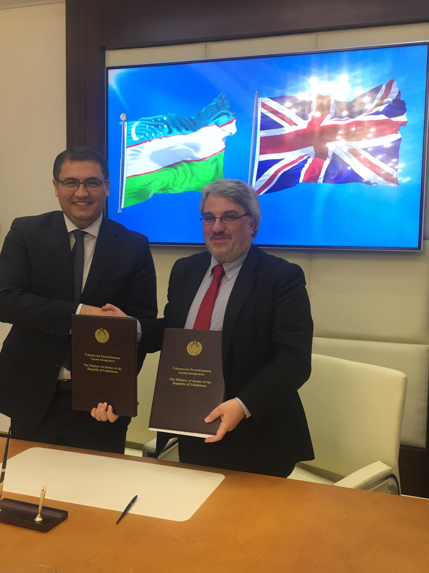 Handshake - Consultancy agreement with the Ministry of Justice in Uzbekistan