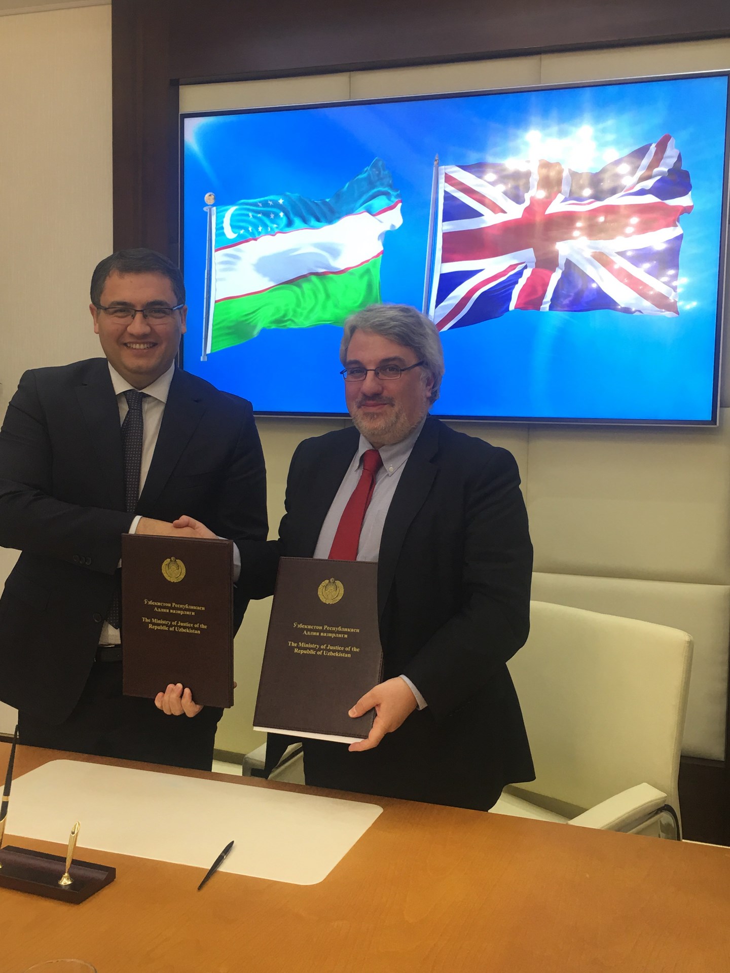 Handshake - Consultancy agreement with the Ministry of Justice in Uzbekistan Handshake - Consultancy agreement with the Ministry of Justice in Uzbekistan