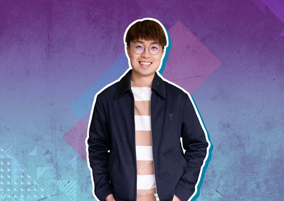 Male student with purple background