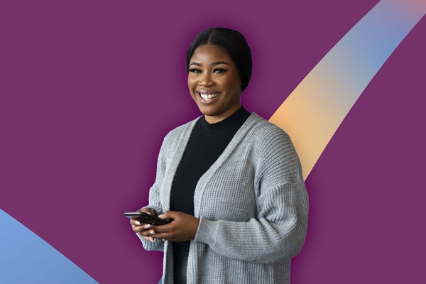 Student holding a mobile phone Student holding a mobile phone
