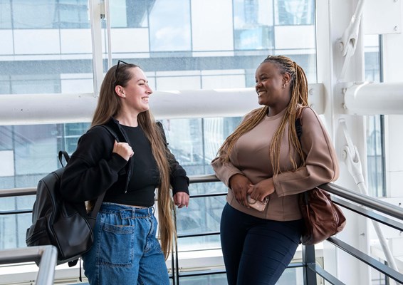 Two female students socialising