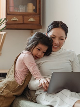 Mother and daughter on laptop Mother and daughter on laptop