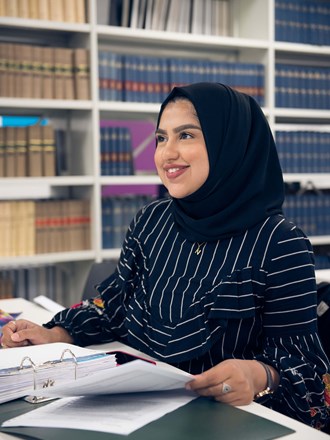 Female student in library