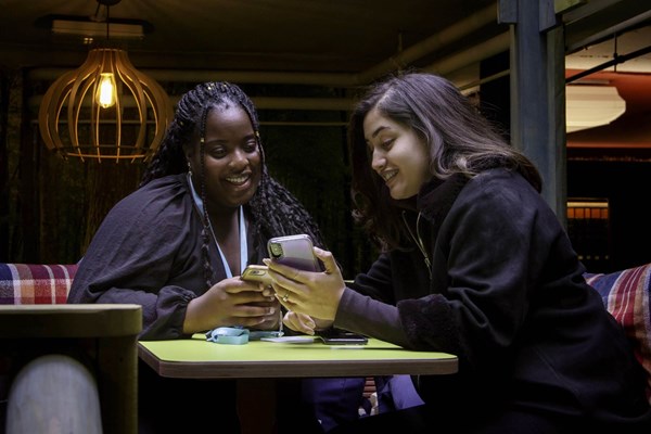 Female students socialising Female students socialising